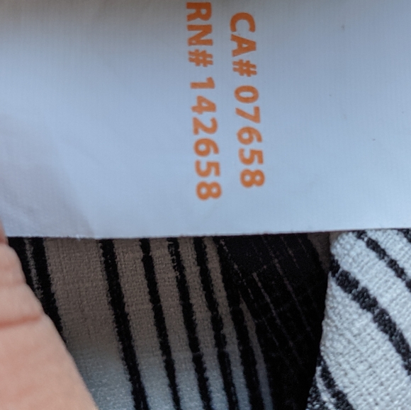 S Chic Black & White One-piece By Revamped - Picture 16 of 16